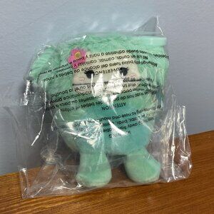Squishmallows Joelle Blue Bigfoot Clip Plush with Flower